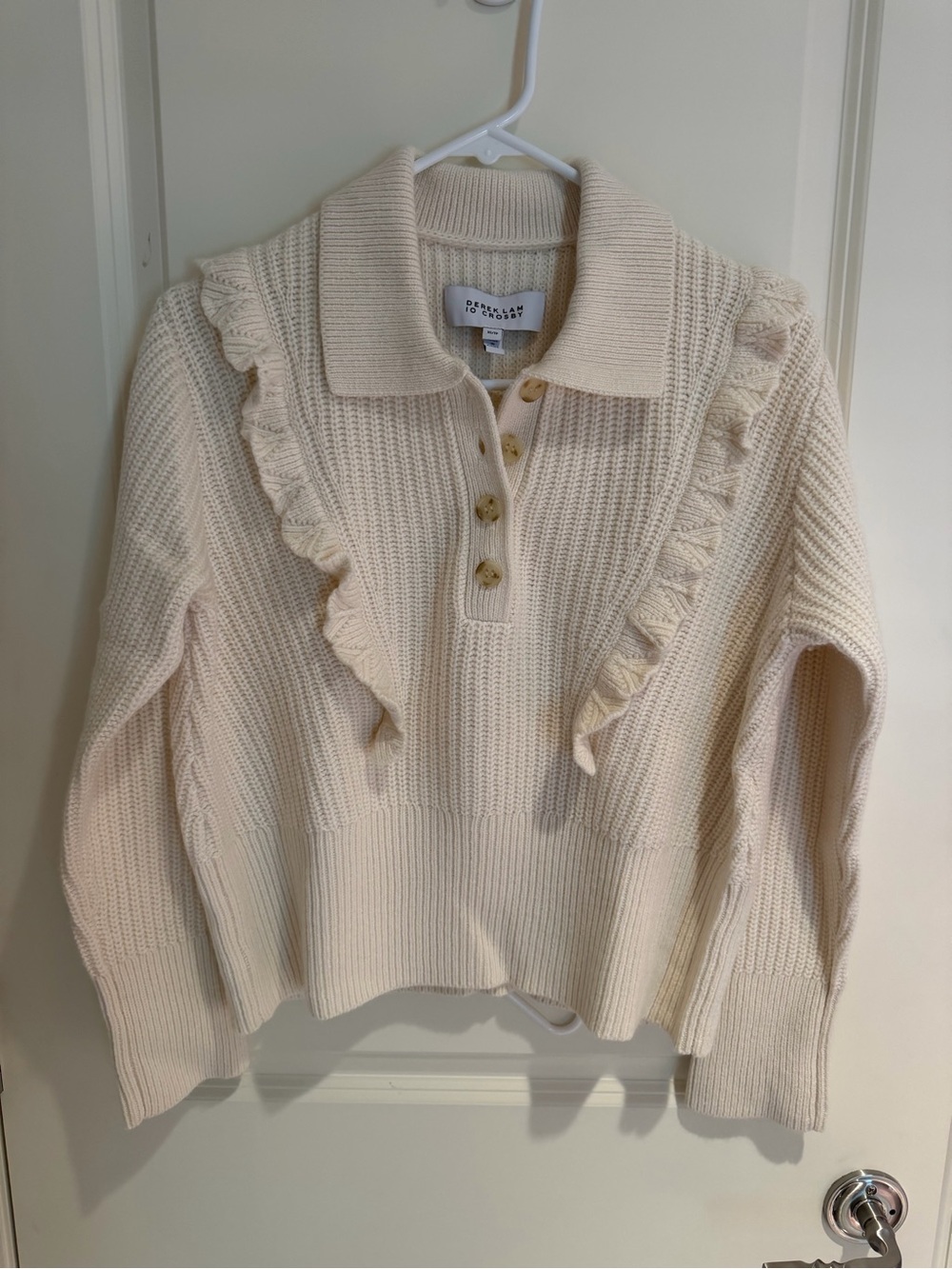 10 Crosby Derek Lam Cream Ruffle-Trim Knit Polo Sweater